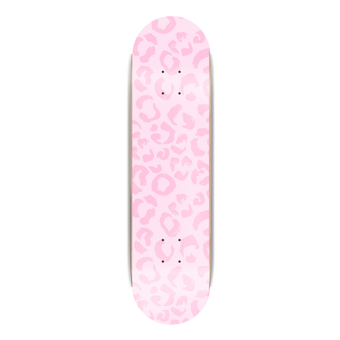 Skateboard deck with pink leopard print pattern on a white background