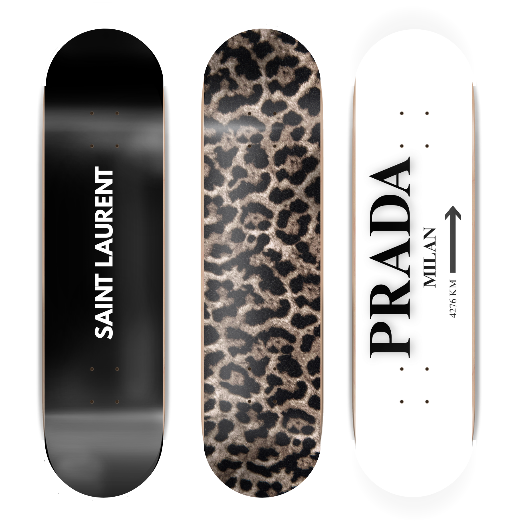 Three skateboard decks with different designs and brand names on a white background